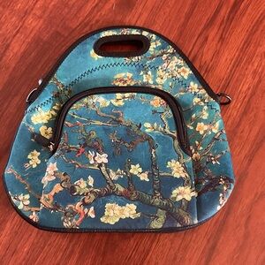 Floral Blue Women's lunch Bag approx 12” x 12” with front pocket